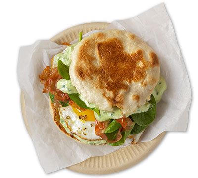 Prosciutto and egg sandwich with Green Goddess yogurt sauce