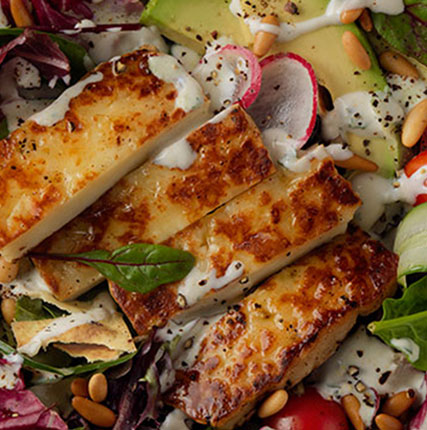 Charred Halloumi Salad with Fresh Vegetables and Lemon-Mint Yogurt Dressing