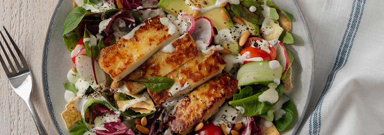 Charred Halloumi Salad with Fresh Vegetables and Lemon-Mint Yogurt Dressing